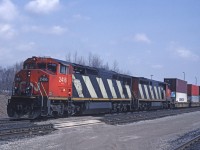 CN Dash8-40W 2416 leads Toronto - Buffalo doublestack train #255 as it pauses at Aldershot Yard.