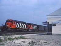 It's a very hot but quiet afternoon in Foleyet as CN 5028 with train #303 waits for a crew to take it west. 