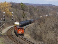 CN 554 approaches Hamilton Junction, passing under a classic signal bridge.