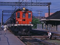 CN train #955 stops while the switch is thrown that will allow it to go around the loop and head back to Central Station in downtown Montreal.