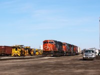 Pulling down track CL-07, CN 5730 leads 435 past an armada of track machines waiting to begin the night's work on the north track of the Dundas Sub. CN is conducting a major trackwork project including tie replacement, new ballast (note Herzog loaded ballast train at left) and new pieces of rail. These days, CN 435 has been running with three engines as it now forwards crude oil loads from Mac yard to Brantford, where the oil is interchanged to SOR for movement to the IOL refinery at Nanticoke.