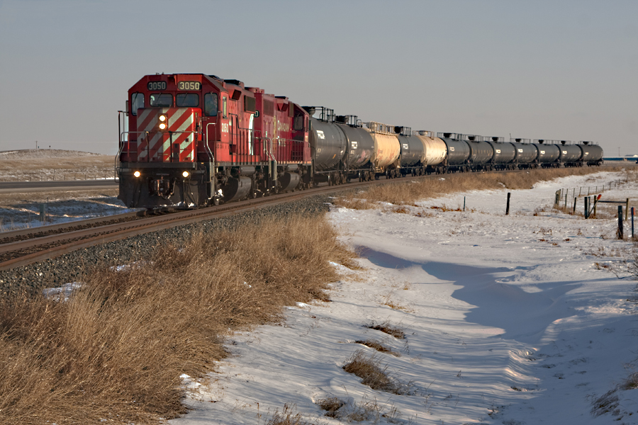The northbound "Olds Wayfreight" approches the old station of Wessex on the Red Deetr Sub. This train was one of the last locals on the Red Deer sub to have a caboose asigned to it, although in recent years the caboose has vanished...