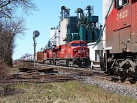 Stacked in the siding behind CP 8831-254 is D&H 7304-T76 as they wait for CP 9623-243 to clear the east switch at mile 54.8 on the CP's Windsor Sub.