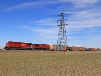 CP 8895 with CP 9551 are in charge of train 243 at mile 88 on the CP's Windsor Sub.