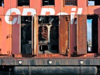 After years of service for her owner CPRail, former RS18u sits outside at Guelph Jct with hood doors open exposing the guts to the elements of mother nature. Used as a parts unit for a few of the MLW's Ontario Southland owns, the future doesn't look bright for this unit and others a like as second hand EMD/GMD locomotives have new homes at the OSR.