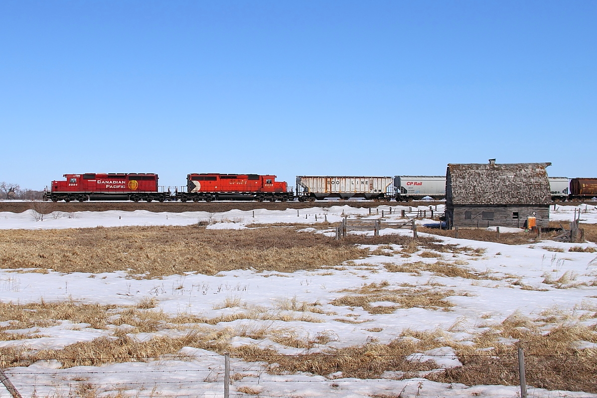 CP 5994 leads 411 past the old farm at Esmond.