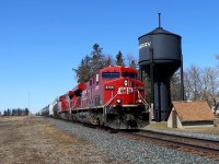 CP 8700 leads 118 past the old water tower in Carberry.