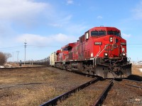 Crude oil loads pound the CN diamonds at West Portage.