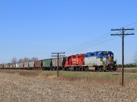 Approaching the west switch at Kent Bridge, D&H 7304 with CP 7307 lead train T76 eastward at mile 56.91 on the CP's Windsor Sub. Going into the siding ahead of T76 is CP 8831-254 where they will wait for westbound CP 9623-243. T76 will complete switching duties at the Kent Bridge mill upon departure of 254. 

