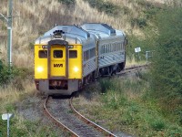 The VIA Malahat, on this day made up of two BUDD RDC cars, sadly no longer running making it's way through one of the many municipalities around Victoria before arriving at Victoria Station, also sadly no longer in existence.