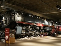 The limitations of even the best indoor display of preserved rail equipment become evident when trying to photograph said displays. Thankfully I visited on a weekday, so the museum was particularly devoid of errant children, which are all too common when trying to photograph museum displays. This 1928 Angus built "Northern" 4-8-4 is part of the Canada Science and Technology Museum's collection, of which only a small part is on public display. The red sign in the foreground indicates that a guided tour of the locomotives is available at 10:15am. The cabs are set up to allow visitors to walk through and experience what it's like to be inside a steam engine.