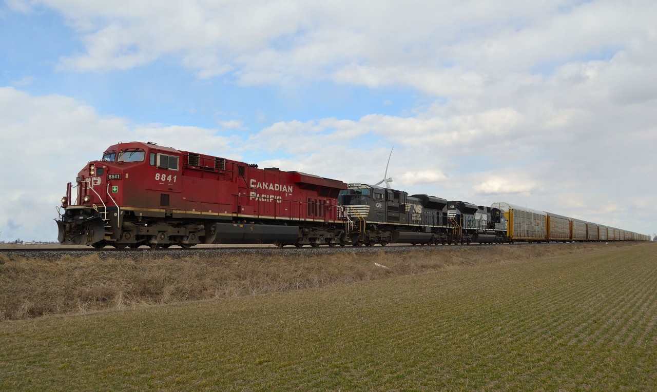 CP 147 heads westbound towards Walkerville after passing thru Haycroft. The NS units are returning back to the US after going east on a 608 crude oil train yesterday.