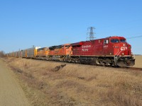 CP 147 heads westbound approaching Tilbury led by CP 8841, BNSF 9133 & BNSF 8859. This same power was on an eastbound 608 crude oil train the day before.