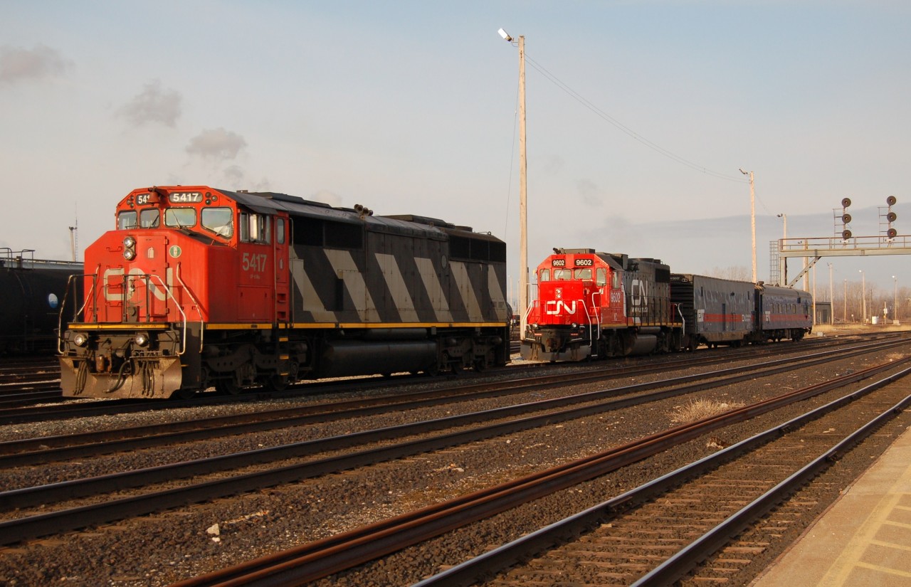 CN 5417 backs onto CN/IC 9602 and test train at Sarnia. I believe the IC 9602 and test train were parked here the previous night after comming over from Port Huron, however I think a canadian equiped unit was needed for the train to continue west this morning.