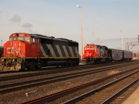 CN 5417 backs onto CN/IC 9602 and test train at Sarnia. I believe the IC 9602 and test train were parked here the previous night after comming over from Port Huron, however I think a canadian equiped unit was needed for the train to continue west this morning. 