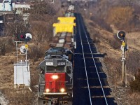 Get your shots, for this Espee's days are numbered.

Stratford's own tunnel motor is in high throttle position hauling Goderich-Exeter train #432 east, seen cruising upgrade on the eastern pull of the Humber River valley. He has a good 2000ft worth of train for MacMillan Yard hailing from Goderich, Kitchener and Stratford all together.