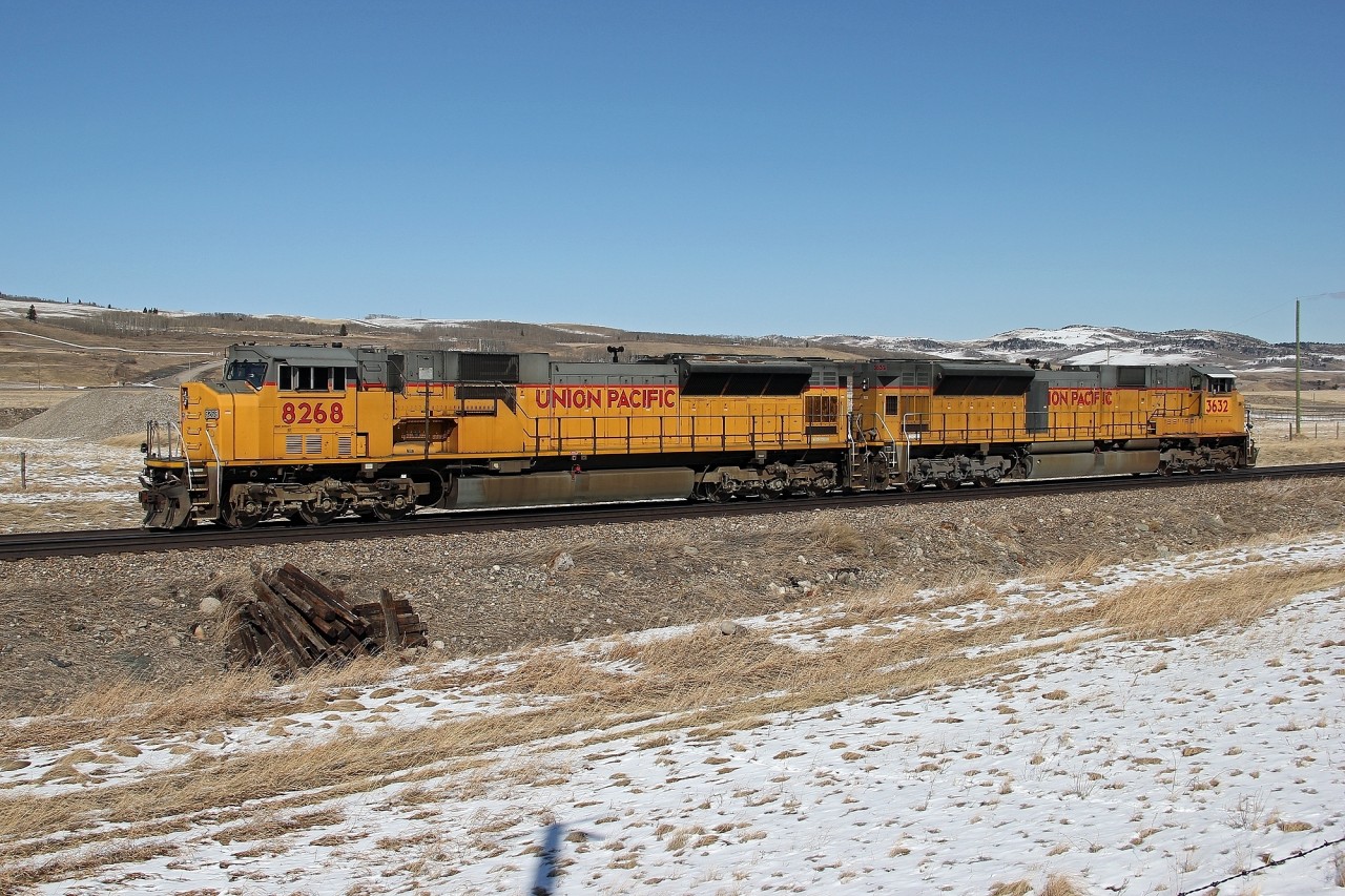 SD9043MACs 8268 and 3632 idle in the siding at Burmis.