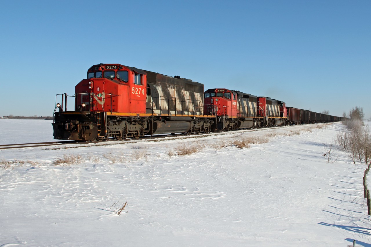 SD40-2(W)s 5274, 5330 and 5334 lead CN 556 from Fort McMurray into Edmonton.