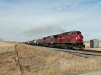 AC440CWs 9727 and 9525 lead a Calgary bound train south on the Red Deer Sub.