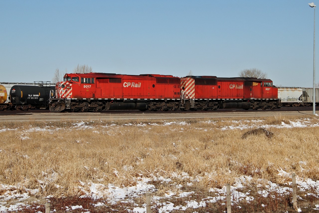 CP SD40-2Fs 9017 and 9001 idle at the east end of Lethbridge Yard.