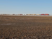 SD40-2 5871 and GP38-2 3034 head north on the Aldersyde Subdvision.