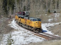 UP SD9043MAC 8294 leads Potash empties eastbound on the Crowsnet Sub.