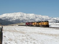 UP SD9043MAC 8294 and  AC4400CW 6905 along with CP AC4400CW 8640 and ES44AC 8859 lead Potash empties through Burmis.
