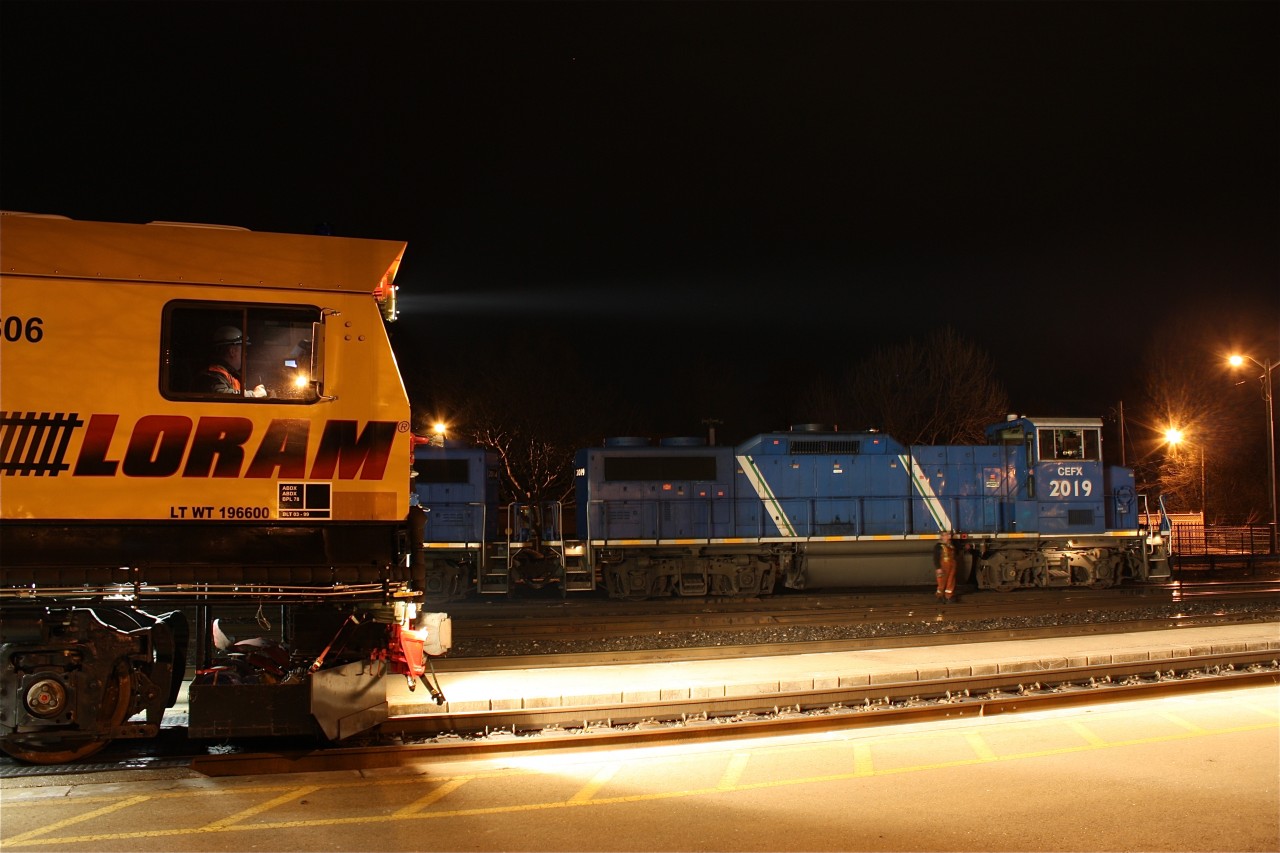 The early morning hours finds SOR's Garnet bound freight with three GP20Ds and a GP40 waiting in the yard for the rail grinder and CN train #397 to clear before doubling its train and heading southward on the Hagersville sub.