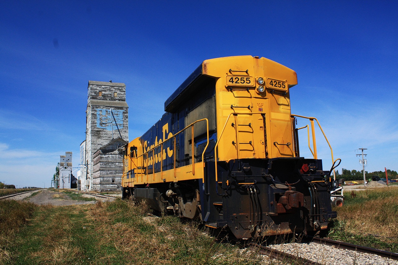 SSR 4255 in its former Santa Fe paint is parked at the east end of the elevator track at Fillmore Saskatchewan getting some work done before been put into service. Just another gem in the Saskatchewan shortline scene.