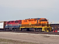 QGRY 2303 leads an early GEXR 433. The train is preparing to back out of London Yard onto the CN Dundas, where it will proceed onto home tracks just north of here.