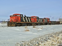 A trio of GMD1's CN 1433, 1409 and 1438 bring cars off the Scotford Industrial Lead into Scotford Yard.