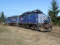 GP9 SRY 110 and GP7 SRY 129 head back to the main line having set off their tank cars at Superior Propane.