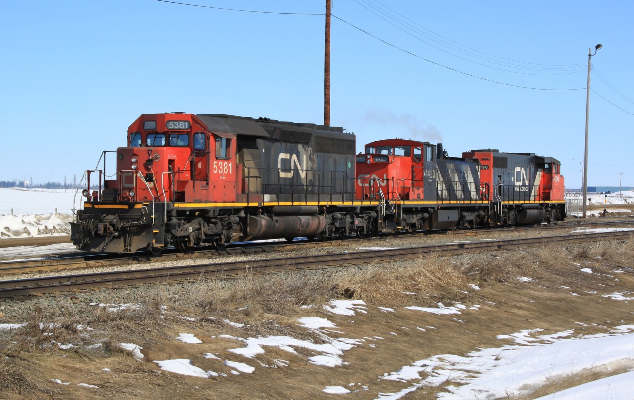 Switching set SD40-2 5381, GMD1 1423 and GP38-2(W) 4790 wait for their next assignment at CN's Scotford Yard.