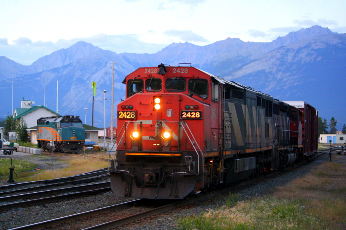 CN classic striped power pulls into Jasper to work yard then head back east.