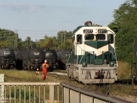 A RailServe crew is busy switching tank cars of crude oil in Clarkson Yard, for the nearby Petro Canada refinery. LTEX GP38 2077 is the power of the day, one of two units stationed at the plant for switching inside and moving cars between there and here, where they are lifted and set of by CN locals along the Oakville Sub.