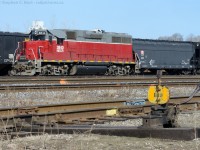 <b>B43:</b> NECR 3840 basks in the afternoon sunlight framed beside an old CN Switch (Dating to '65 or so) in the SOR Yard at Hamilton. 