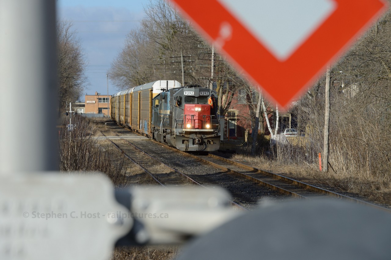 Smoke Break for the Conductor as the train has slowed to 15 MPH for the trek through the many crossings in  Guelph, and rule 42 protection at Guelph Station for GO construction. A perfect time for a light and smoke en-route to Toronto.