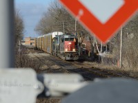 <b>Smoke Break</b> for the Conductor as the train has slowed to 15 MPH for the trek through the many crossings in  Guelph, and rule 42 protection at Guelph Station for GO construction. A perfect time for a light and smoke en-route to Toronto.