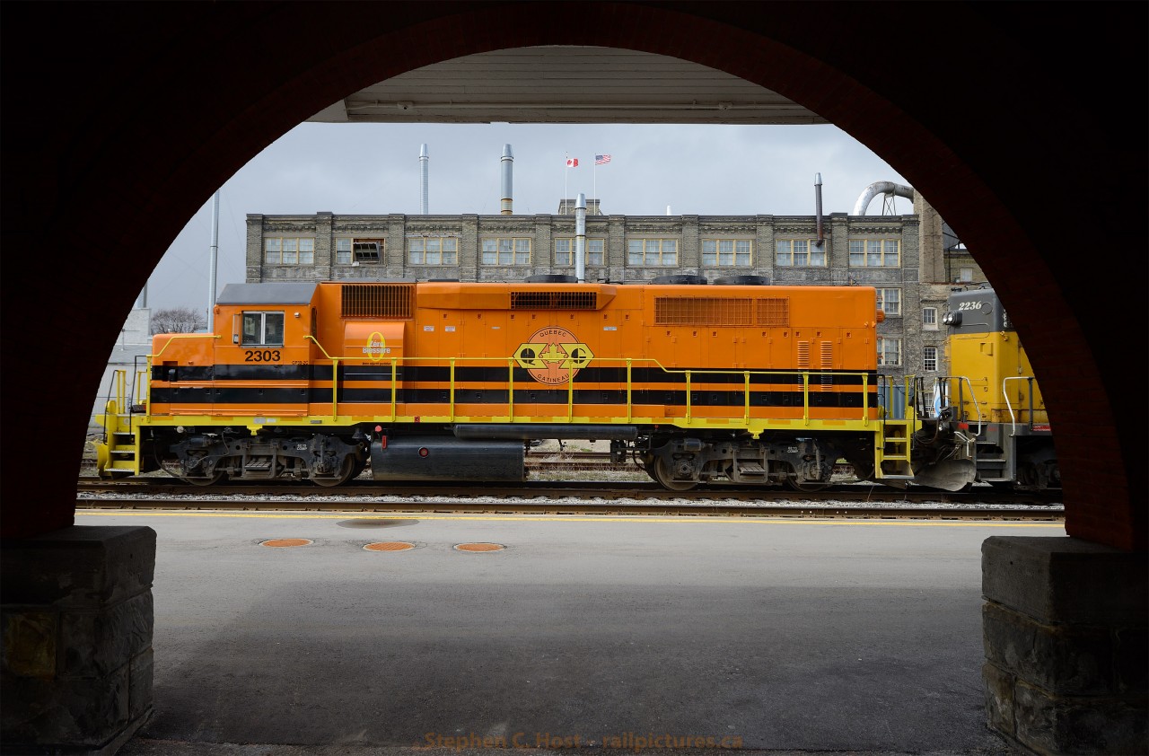 The Orange Invasion has begun - here QGRY 2303 is on the point of GEXR train 516 (Stratford local which terminated at Kitchener on Saturday) and is seen through the archway of the Kitchener VIA/GO station. At present GEXR's motive fleet is a rainbow of Railtex, Rail America, Southern Pacific, Lessor, and other Shortline colours - in time it is likely to give way to the Orange Invasion. Get your shots while you still can...