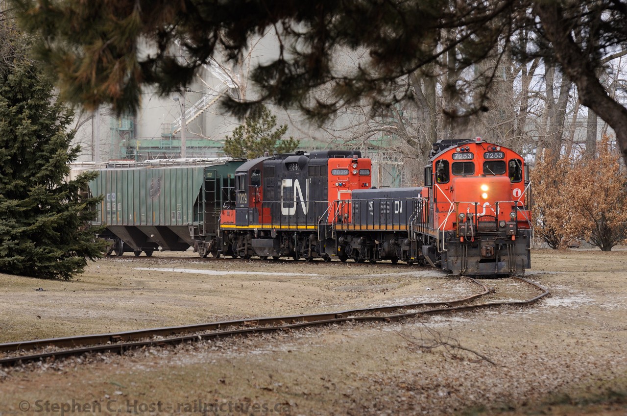 Point Edward is a stones throw away (across the street) and we are at the near end of what remains of the spur of the same name in Sarnia - about 2.8 miles long. CN Slug set is being operated by the job symbol IOX - a three man crew who switches Imperial Oil and this Elevator (and any rare moves on the CSX/CN North Interchange in Sarnia). The power is 7253, 277, and 7029 - written in the middle of the rear hood of 7029 is "BLOW ME 2011"