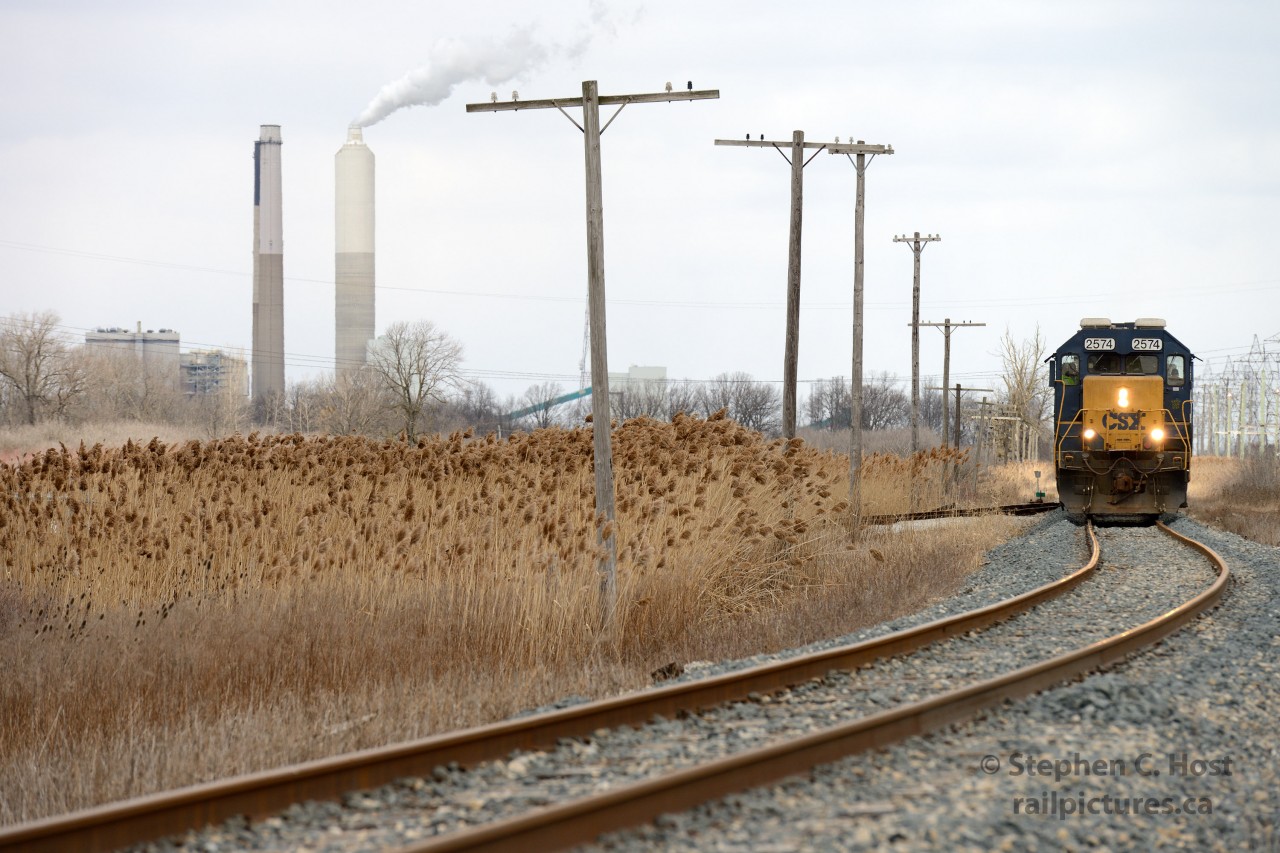 Looming large in the background, north of  Sombra we see former customers which dot the landscape of the old Chesapeake and Ohio, such as the OPG Lambton Generating Station, itself scheduled to close in 2014.(Lambton likely received coal and shipped out fly-ash given the spurs and loop tracks long disused on the property) Behind me is Terra Industries, now owned by the large Fertilizer conglomerate CF. This facility used to receive 20-30 cars a day from Sarnia based D724 but in early to mid 2006 the plant switched to CN, another loss in a long list of 'former customers'.