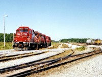 From a collection I purchased, we get a nice mid-summer morning view of the CP yard at Welland and a four-pack of geeps awaiting assignment. Off to the right is CP 5430, still in UP paint during CP's "anything that runs" days of the 1990's. There was no date given for the photo, but we can approximate it to 1997 since STLH 8225 is in fresh paint. Note: taken from railway property, do not attempt this shot!