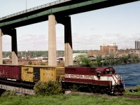 Wisconsin Central transfer run returns to home base in Michigan, doing island hopping in the St. Maries river after picking up cars from CP and AC 