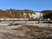 By a sunny saturday morning, TTC #622 is on it's way to Baie-Saint-Paul under the Montmorency Falls.