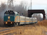 VIA 78 departs Chatham East with billowing smoke pouring from the rebuilt F40PH-2 as it accelerates to track speed. Bringing up the rear of this train is VIA's special charter car the Glenfraiser.