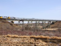 VIA's westbound "Canadian" crosses the Little Saskatchewan River just east of the town of Rivers.