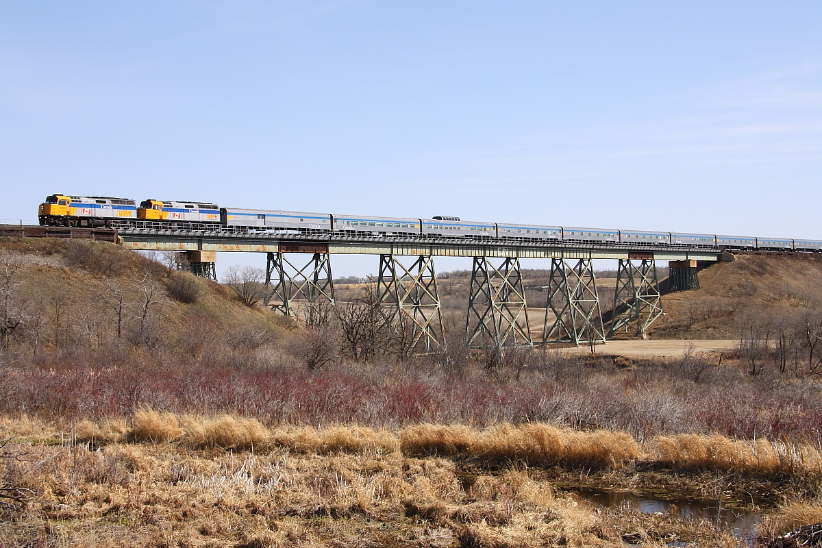 VIA's westbound "Canadian" crosses the Little Saskatchewan River just east of the town of Rivers.