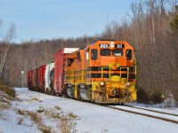 [Note: Leeway granted for first time submission!} On a sunny Monday afternoon the Richmond switcher returns to the mainline after switching the Domtar paper mill up on the hill in Windsor, QC