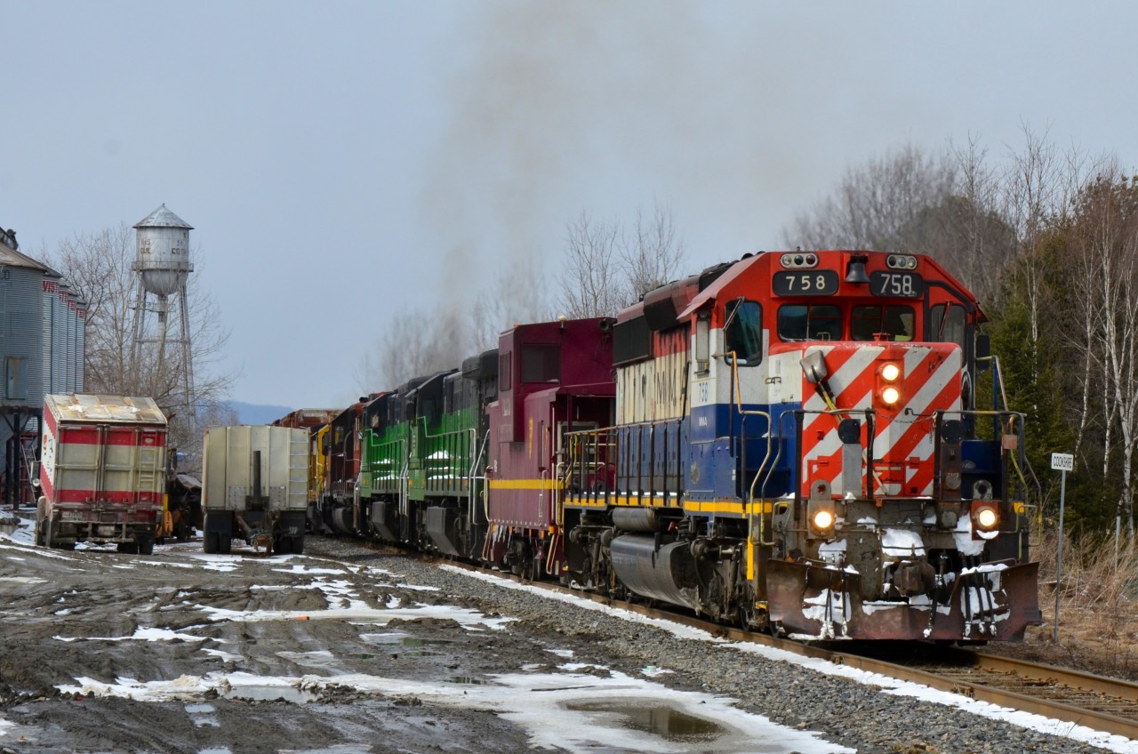 MMA Train 1 combined with empty oil train at Cookshire on a cold, windy April 3, 2013