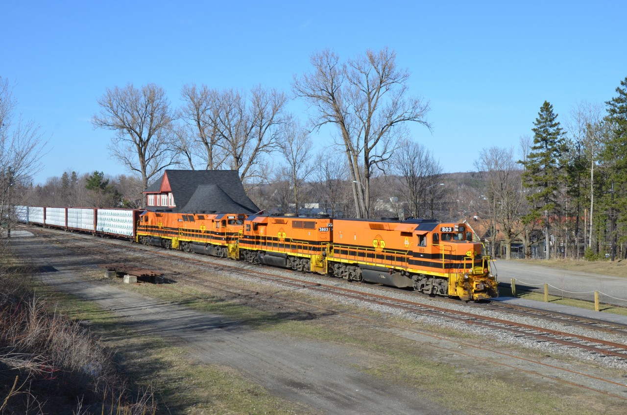 St Lawrence & Atlantic Train 394 passes the former CN station at Coaticook, QC